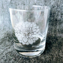 Load image into Gallery viewer, A whiskey glass engraved with a floral design
