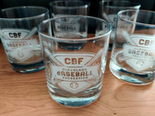 Load image into Gallery viewer, Several whiskey glasses all engraved with the logo for the Cleveland Baseball Federation
